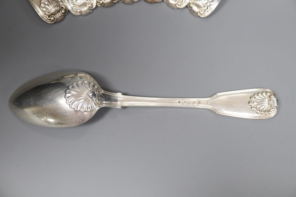 A set of eight George IV silver double struck, fiddle, thread and shell pattern table spoons, William Chawner II, London, 1824,